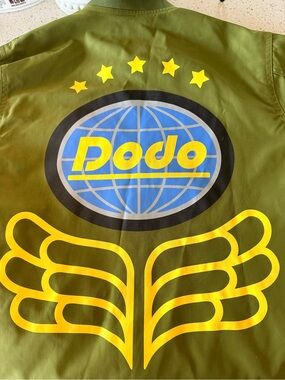 Animal Crossing Dodo Olive Green Graphic Bomber Jacket with Yellow & Blue Logo